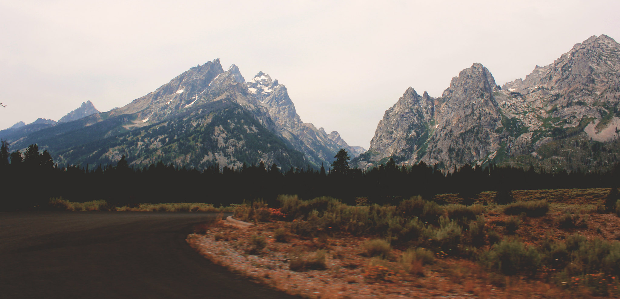 A scenic landscape with mountains and natural beauty